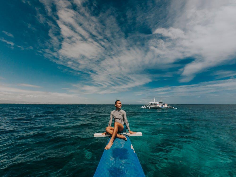 Free  Photo of Man Wearing Rash Guard Stock Photo