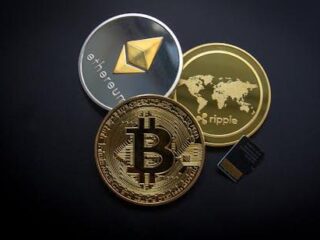 Free Ripple, Etehereum and Bitcoin and Micro Sdhc Card Stock Photo